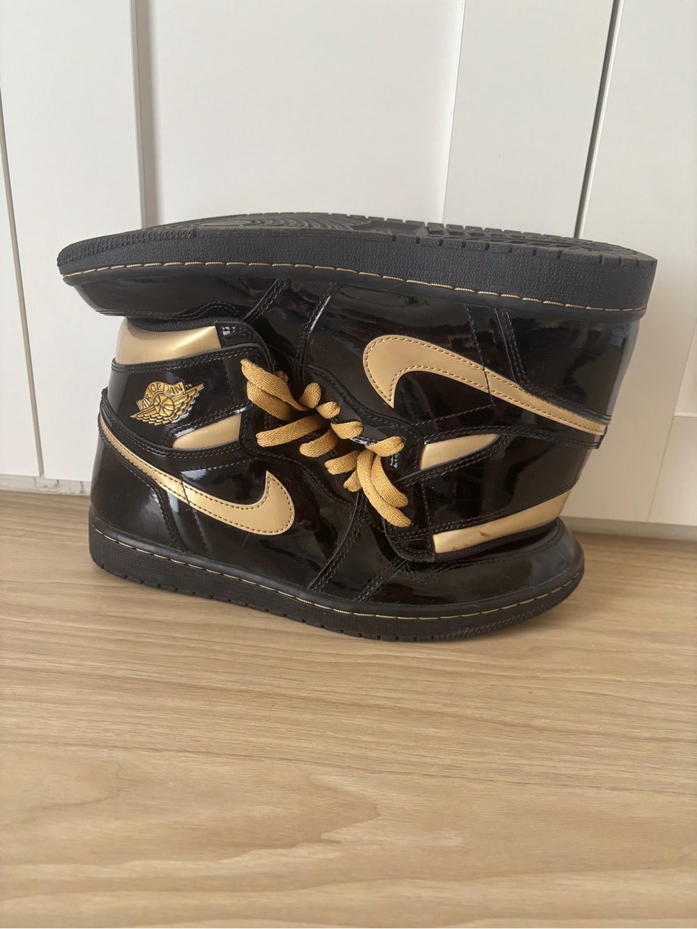 Nike Kids High-Top Sneakers in Black and Gold